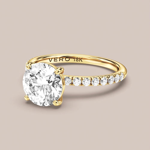 Classic Solitaire with Accent Diamonds engagement ring in 18K yellow gold