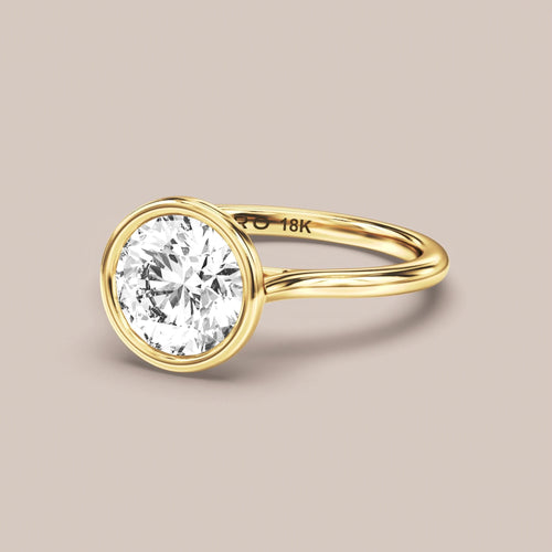 Cathedral Bezel Set engagement ring in 18K yellow gold
