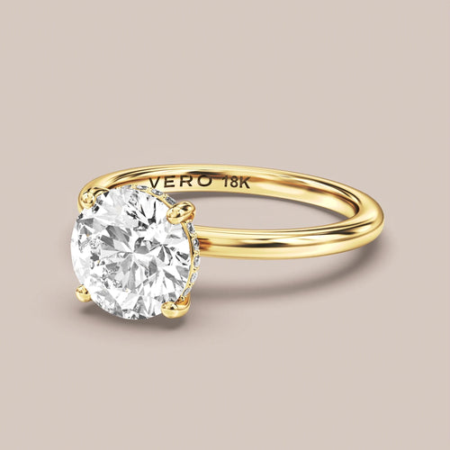 Classic Hidden Halo Solitaire engagement ring in 18K yellow gold