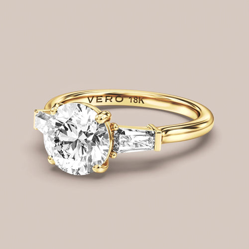 Classic Trinity with Tapered Baguette Side Diamonds engagement ring in 18K yellow gold