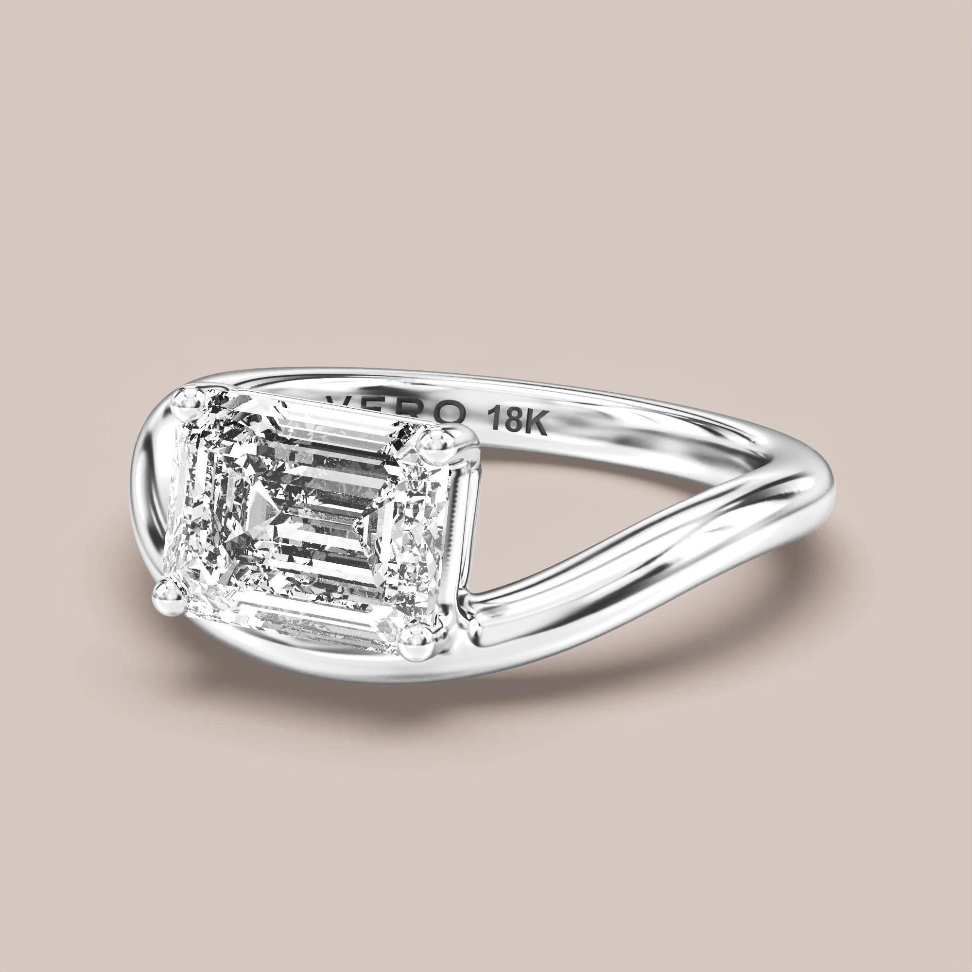 V05 Free Form Bypass in 18K white gold with a emerald diamond