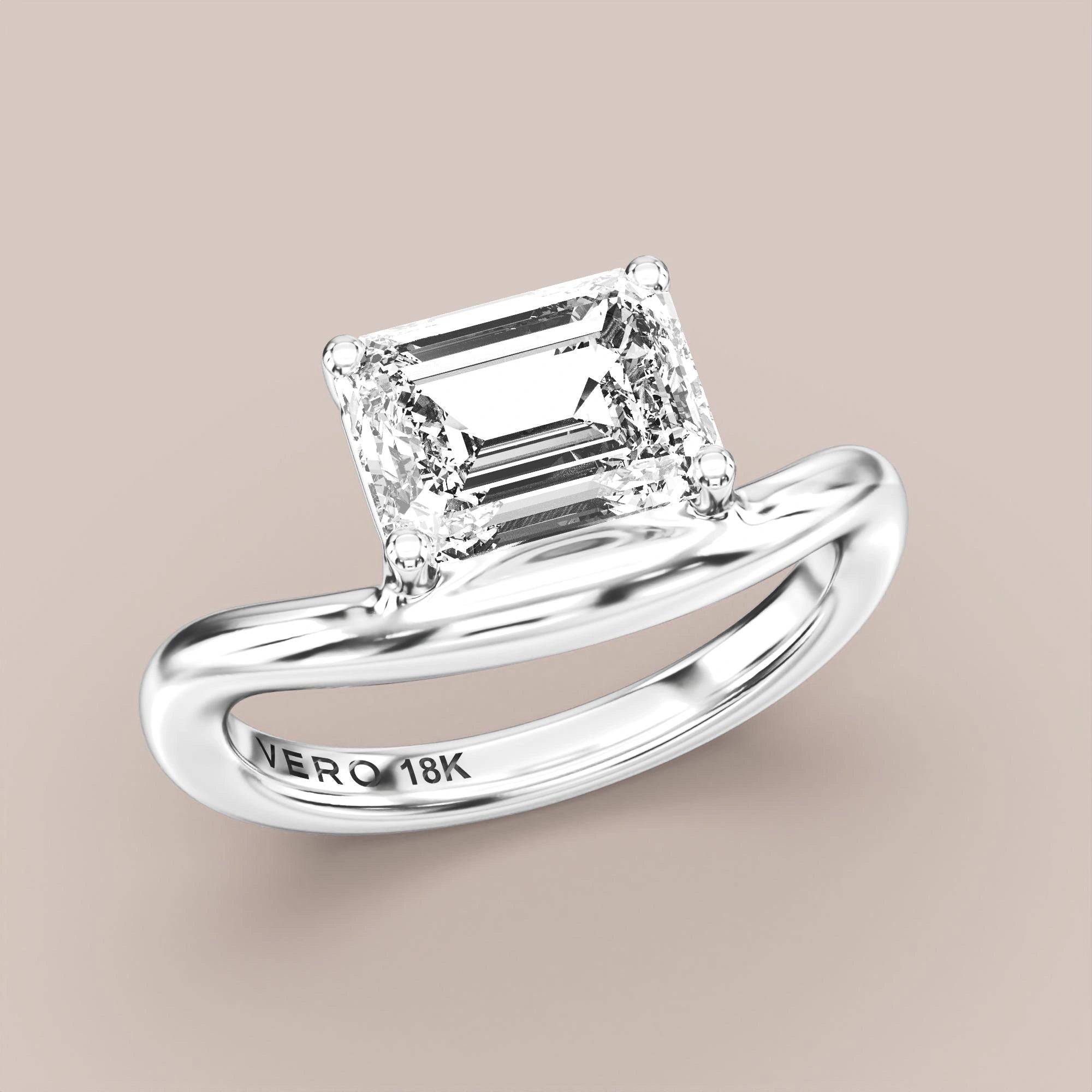 V05 Free Form Bypass in 18K white gold with a emerald diamond