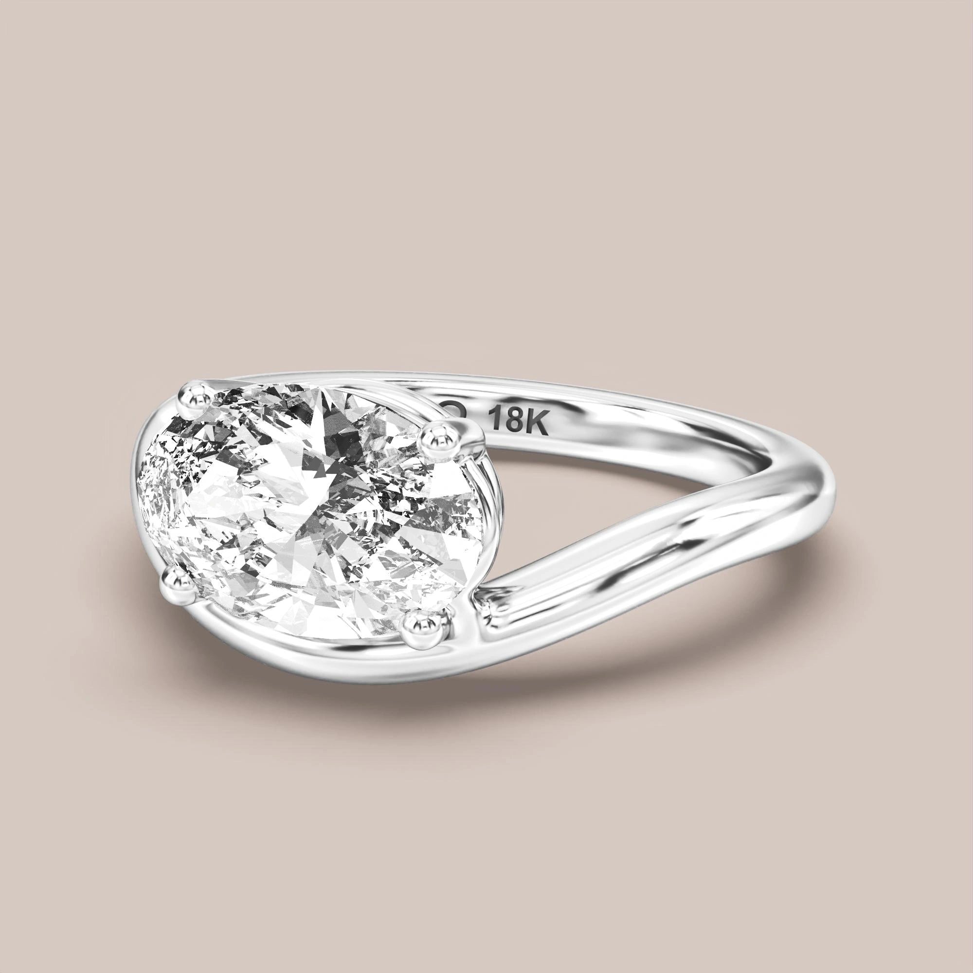 V05 Free Form Bypass in 18K white gold with a oval diamond