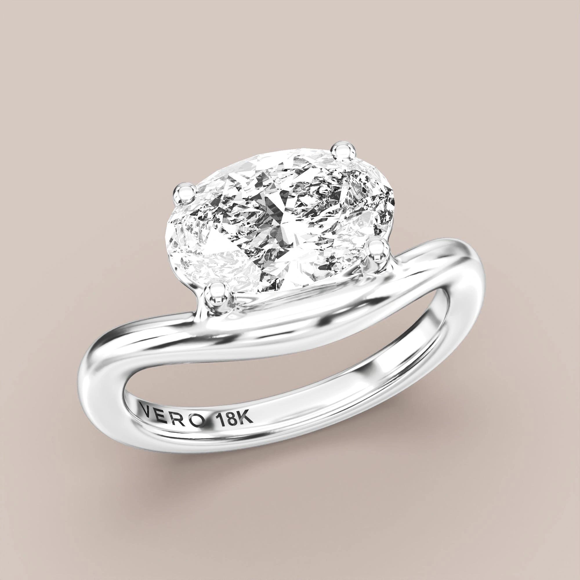 V05 Free Form Bypass in 18K white gold with a oval diamond