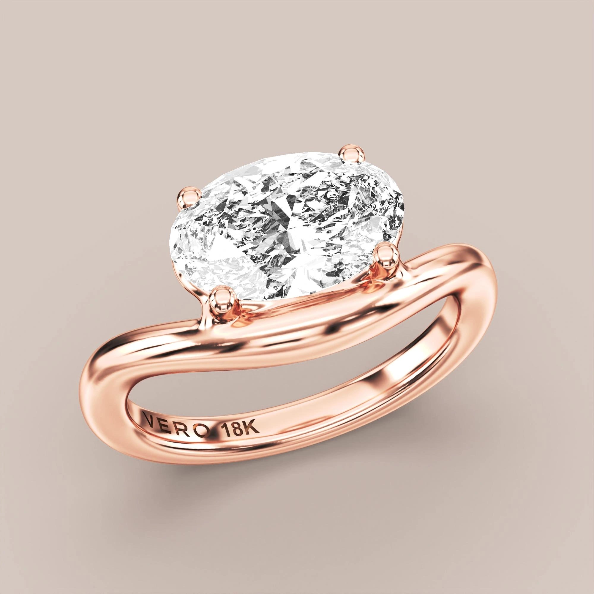 V05 Free Form Bypass in 18K rose gold with a oval diamond