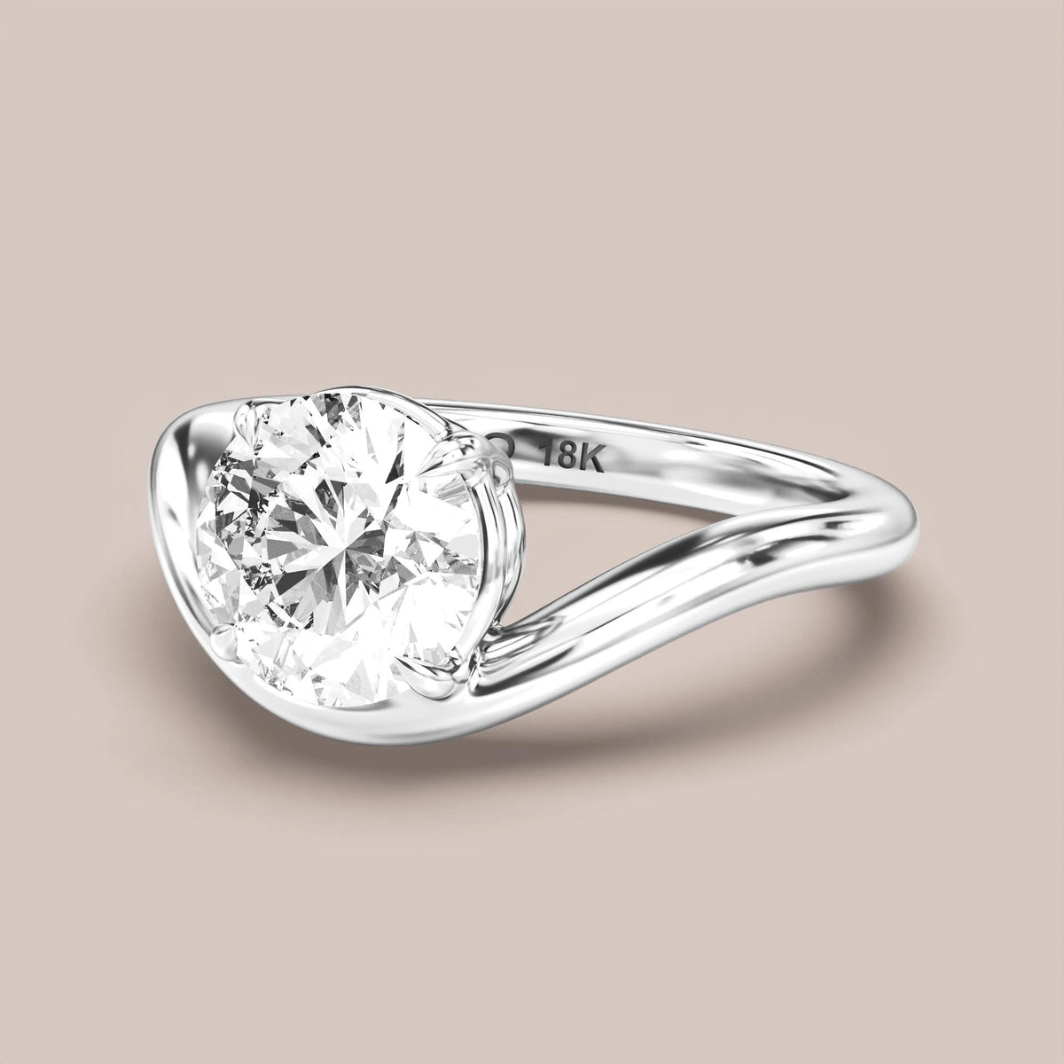 Free Form Bypass engagement ring in 18K white gold with a round diamond, by Vero Diamonds Ottawa
