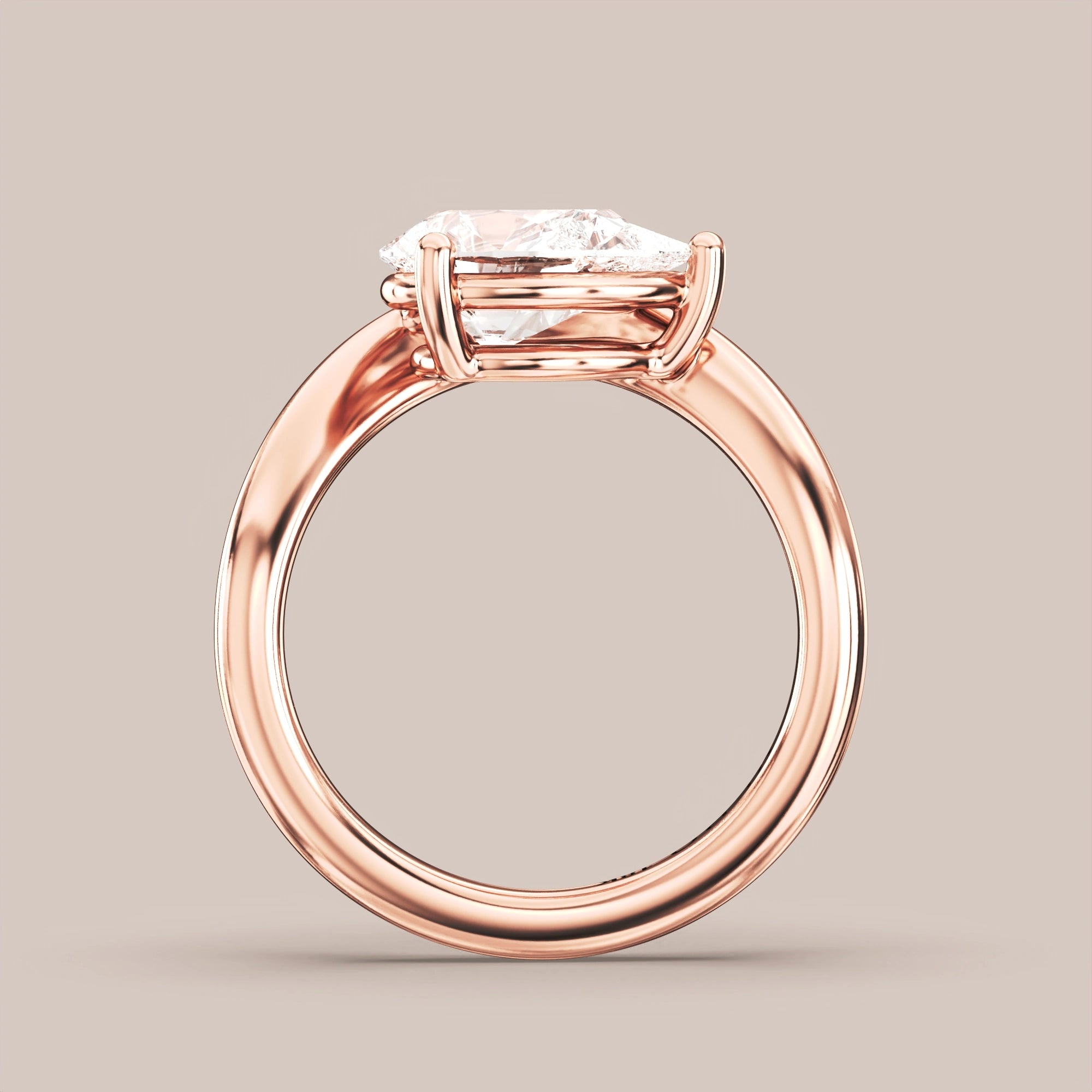 V05 Free Form Bypass in 18K rose gold with a pear diamond