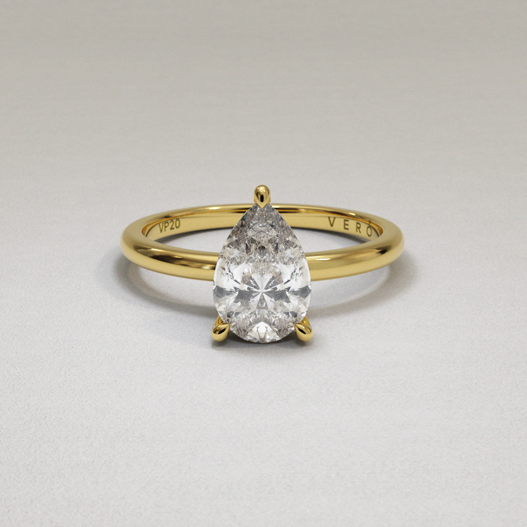 18 Karat Yellow Gold Pear Shape Brilliant Cut Diamond Hidden Halo Enga