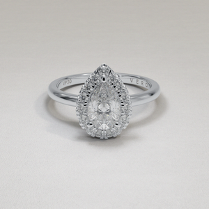 18 Karat White Gold Pear Shape Brilliant Cut Diamond Halo Engagement Ring with Dainty Shank