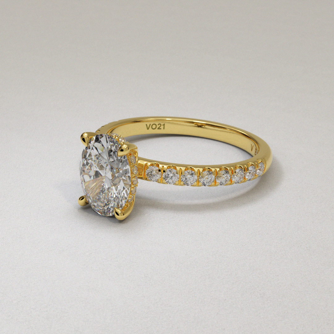 18 Karat Yellow Gold Oval Brilliant Cut Diamond Hidden Halo Engagement Ring with Dainty Side Diamonds