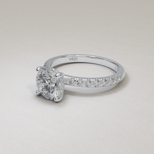 18 Karat White Gold Round Brilliant Cut Diamond Hidden Halo Engagement Ring with Dainty Side Diamonds