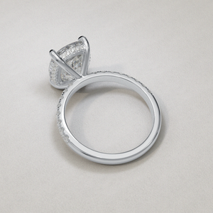 18 Karat White Gold Elongated Cushion Cut Diamond Hidden Halo Engagement Ring with Dainty Side Diamonds Shank